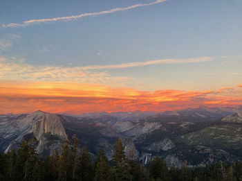 Scenic view of mountains against sky during sunset