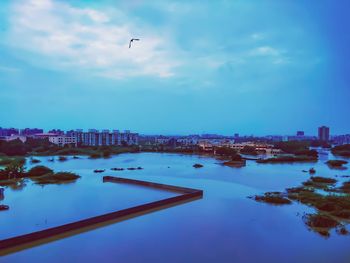 Scenic view of city and buildings against sky