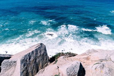 High angle view of beach against blue sky