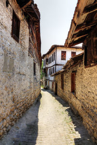 Alley amidst buildings in town