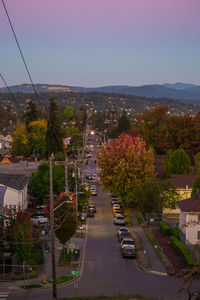 High angle view of street amidst buildings in city