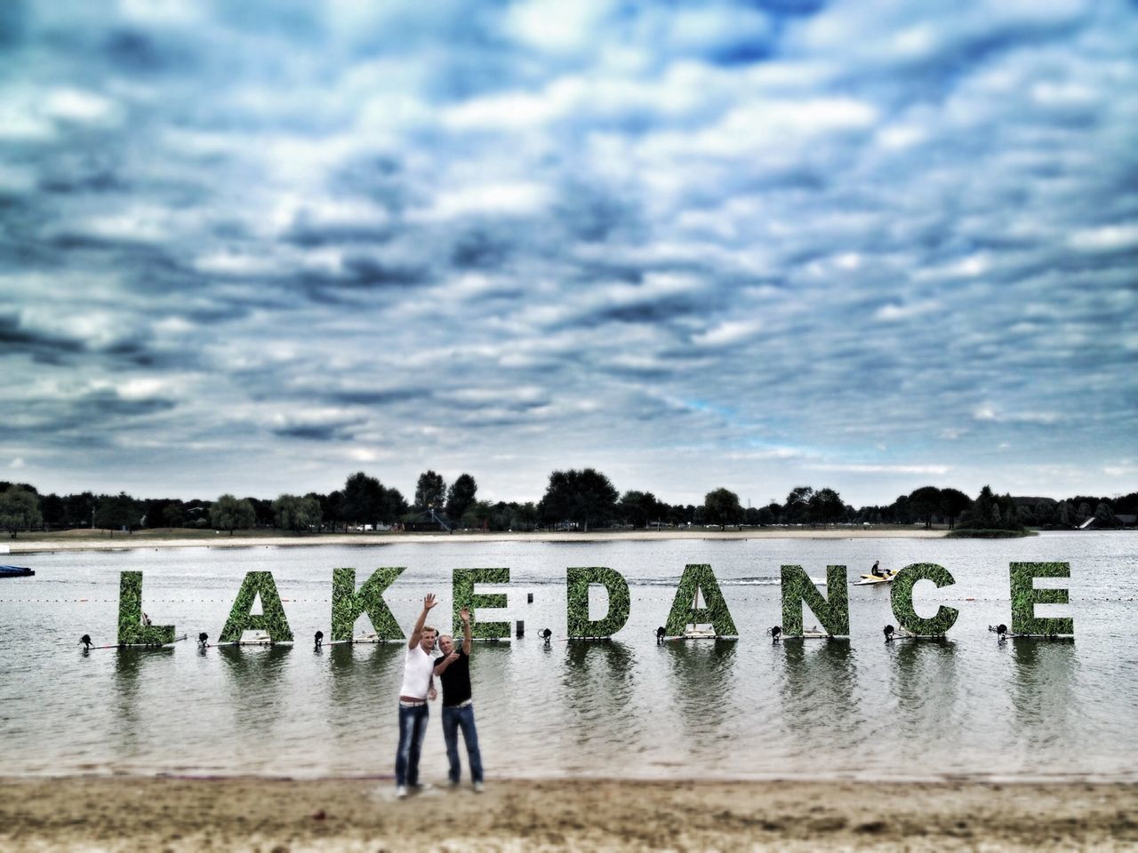 water, sky, cloud - sky, lifestyles, leisure activity, standing, cloudy, rear view, men, beach, lake, full length, sea, cloud, tranquility, tranquil scene, shore, nature