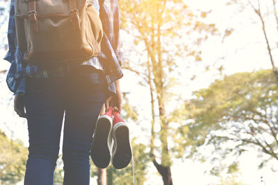 Rear view of tourist walking