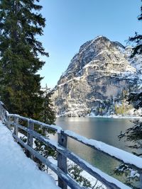 Scenic view of snowcapped mountains against clear sky