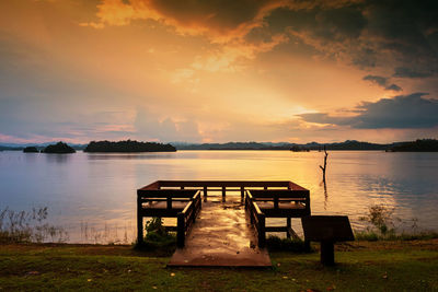 Viewpoint of reservoir lake against sky during sunset