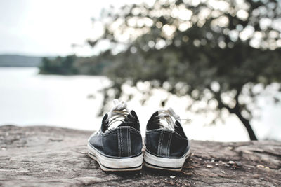 Close-up of black canvas shoes