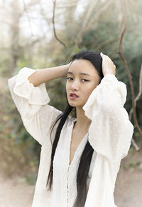 Chinese girl with plumeti blouse