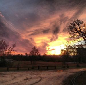 Scenic view of landscape against sky during sunset