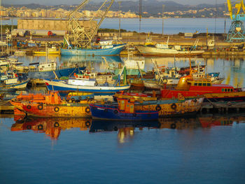 Boats moored in harbor