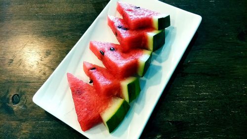 High angle view of fruit salad in plate on table