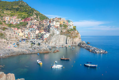 View of village houses  and sea bay of  manarola village at cinque terre area,  italy,  june, 2019.