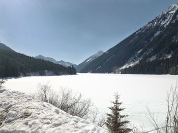 Scenic view of snowcapped mountains against sky