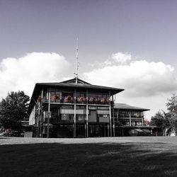 Built structure against cloudy sky