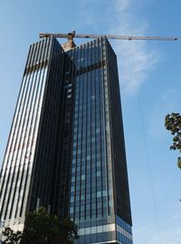 Low angle view of modern buildings against sky