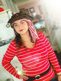 Portrait of beautiful young woman standing in traditional clothing