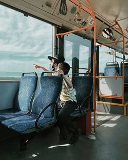 Man sitting in train
