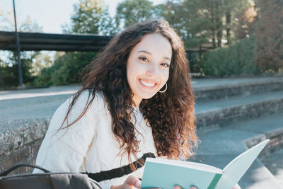 Young woman using mobile phone