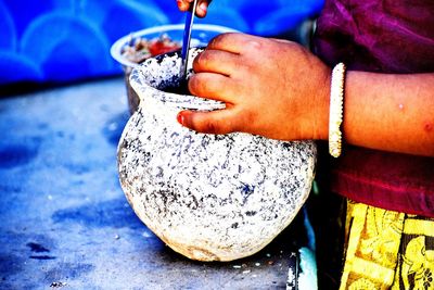 Close-up of woman holding ice cream