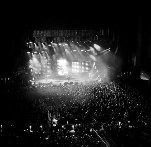 Crowd at music concert at night