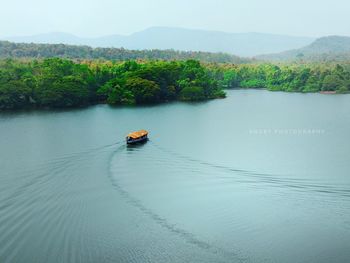 High angle view of boat sailing on river