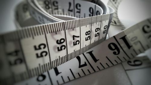 Close-up of white tape measure