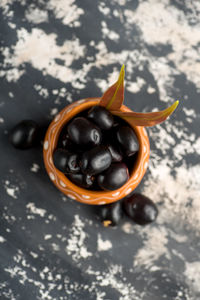 High angle view of black coffee on table