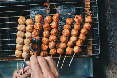 Cooking meatballs in the boiling oil in frying pan