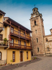 View of historic building against sky in city