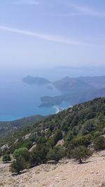 Scenic view of landscape and mountains against sky