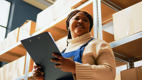 Young woman using digital tablet