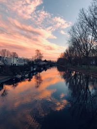 Scenic view of lake against sky during sunset