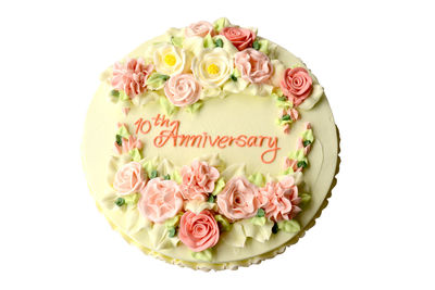 Close-up of pink roses against white background