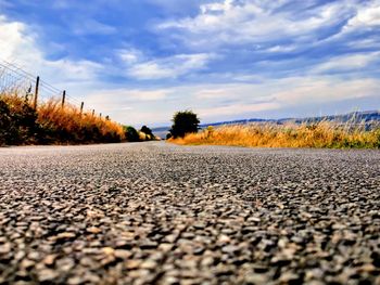 Surface level of road against sky