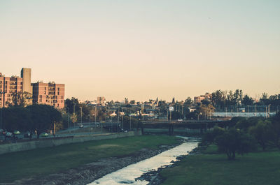 Panoramic view of city buildings against clear sky