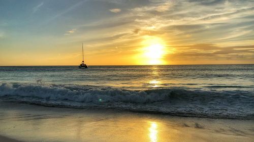 Scenic view of sea against sky during sunset