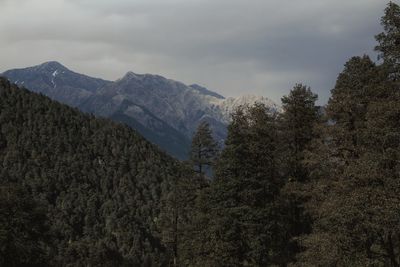 Scenic view of mountains against sky during winter