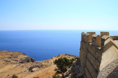 Scenic view of sea against clear blue sky