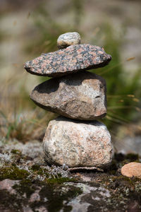 Close-up of stone stack on rock