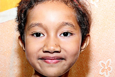Close-up portrait of smiling boy