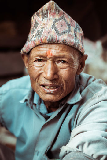 PORTRAIT OF MAN SMILING