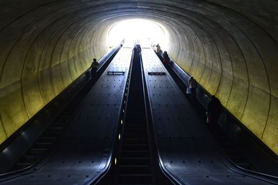 Low angle view of escalator in tunnel washington subway