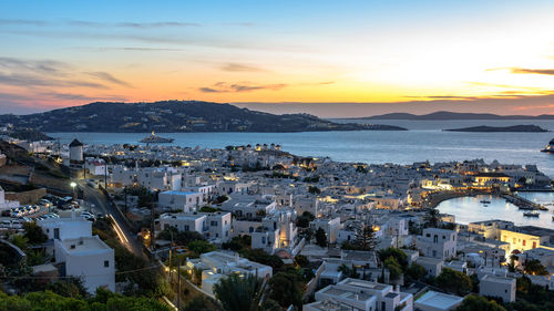 High angle view of townscape by sea