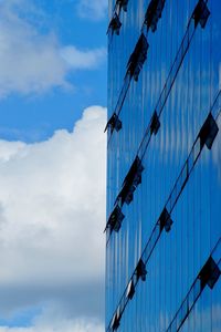 Low angle view of modern building against sky