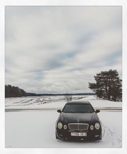 Car on road against sky