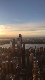 High angle view of buildings against sky during sunset