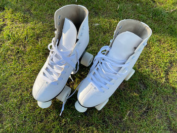 High angle view of shoes on field