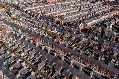Aerial view of the rooftops old terraced houses on back to back streets in the suburbs of a uk city