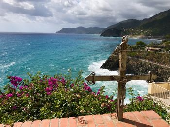 Scenic view of sea against cloudy sky
