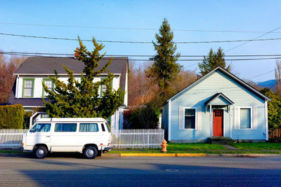 Car on street against building