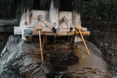 View of birds in water fountain